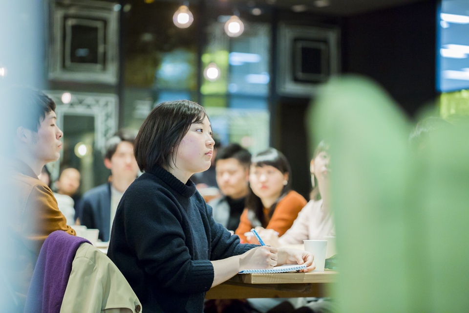 girl taking notes