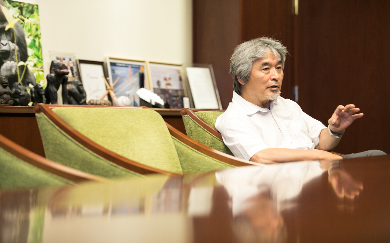 Professor Juichi sitting in a chair talking