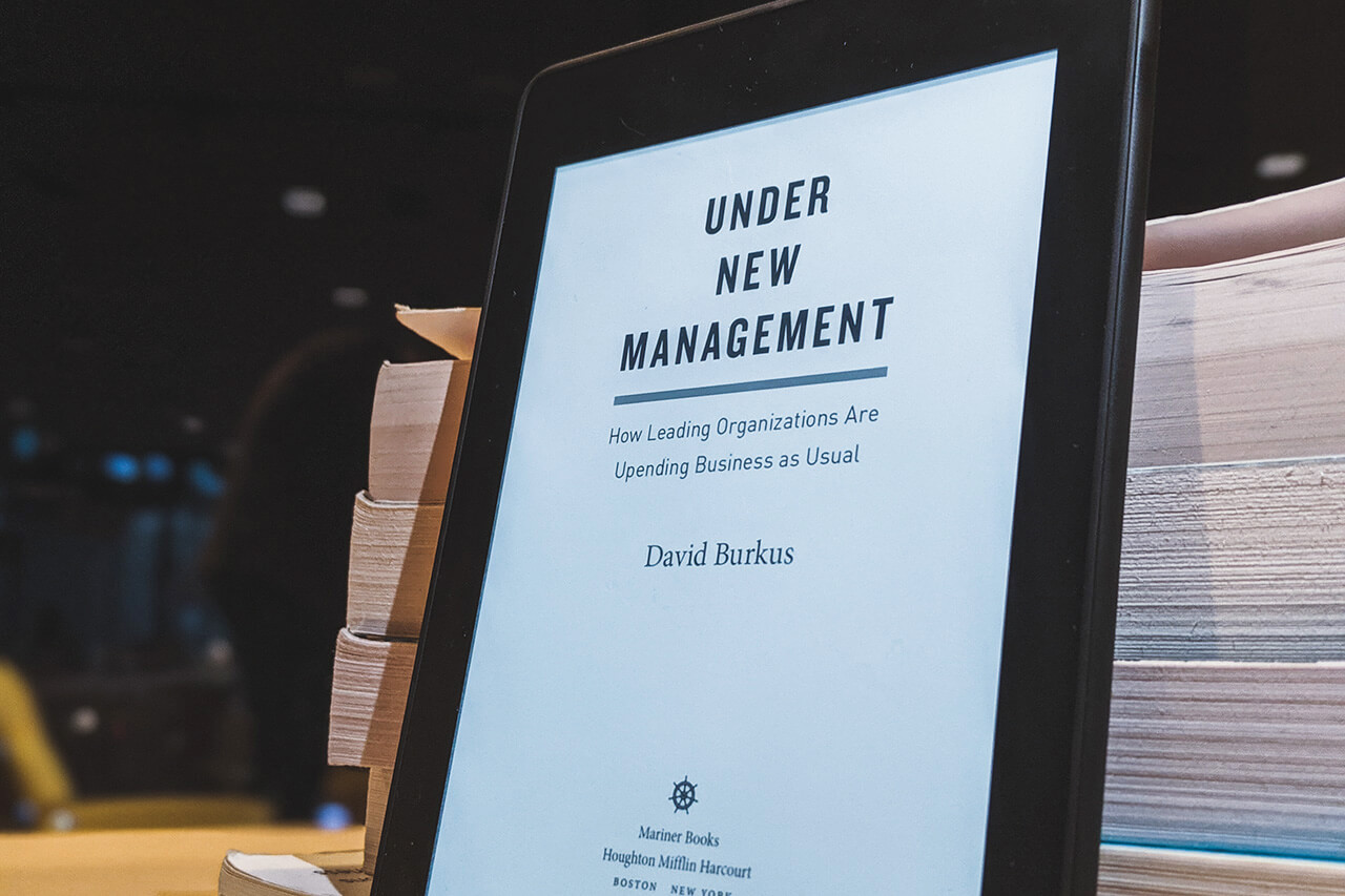 The e-book cover of David Burkus' book, Under New Management